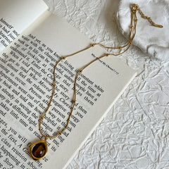 2025 Nouveau Murad Tiger's Eye Necklace｜Light Luxury Non-Fading Titanium Snake Bone Sweater Chain